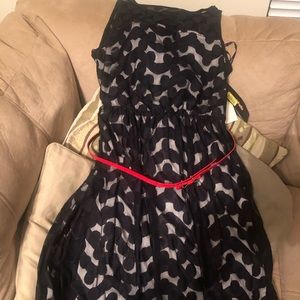 Black dress with red belt. New